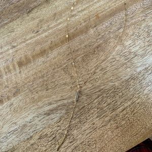 Gold cross laureat necklace